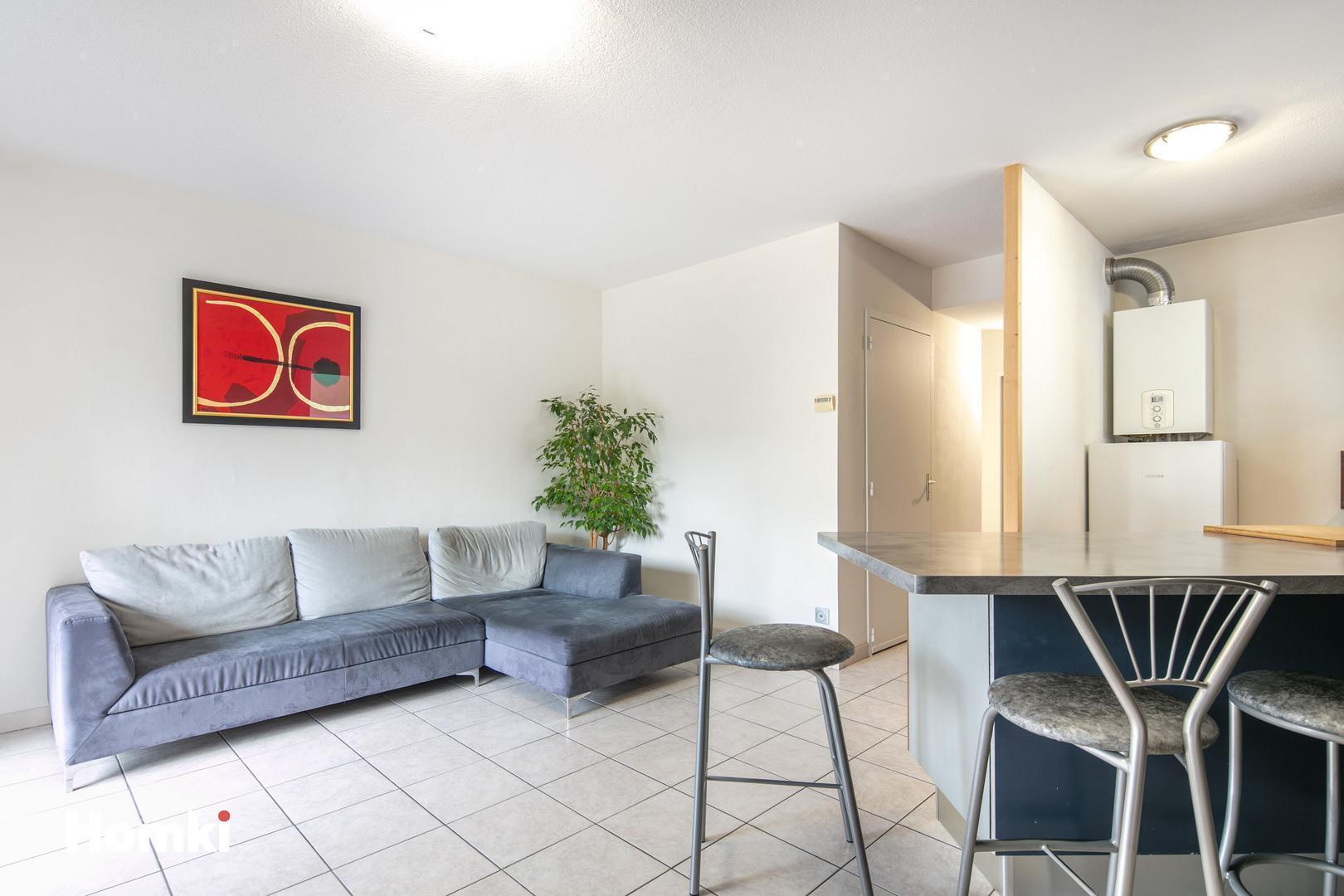 Homki - Vente Appartement  de 61.0 m² à Grenoble 38000