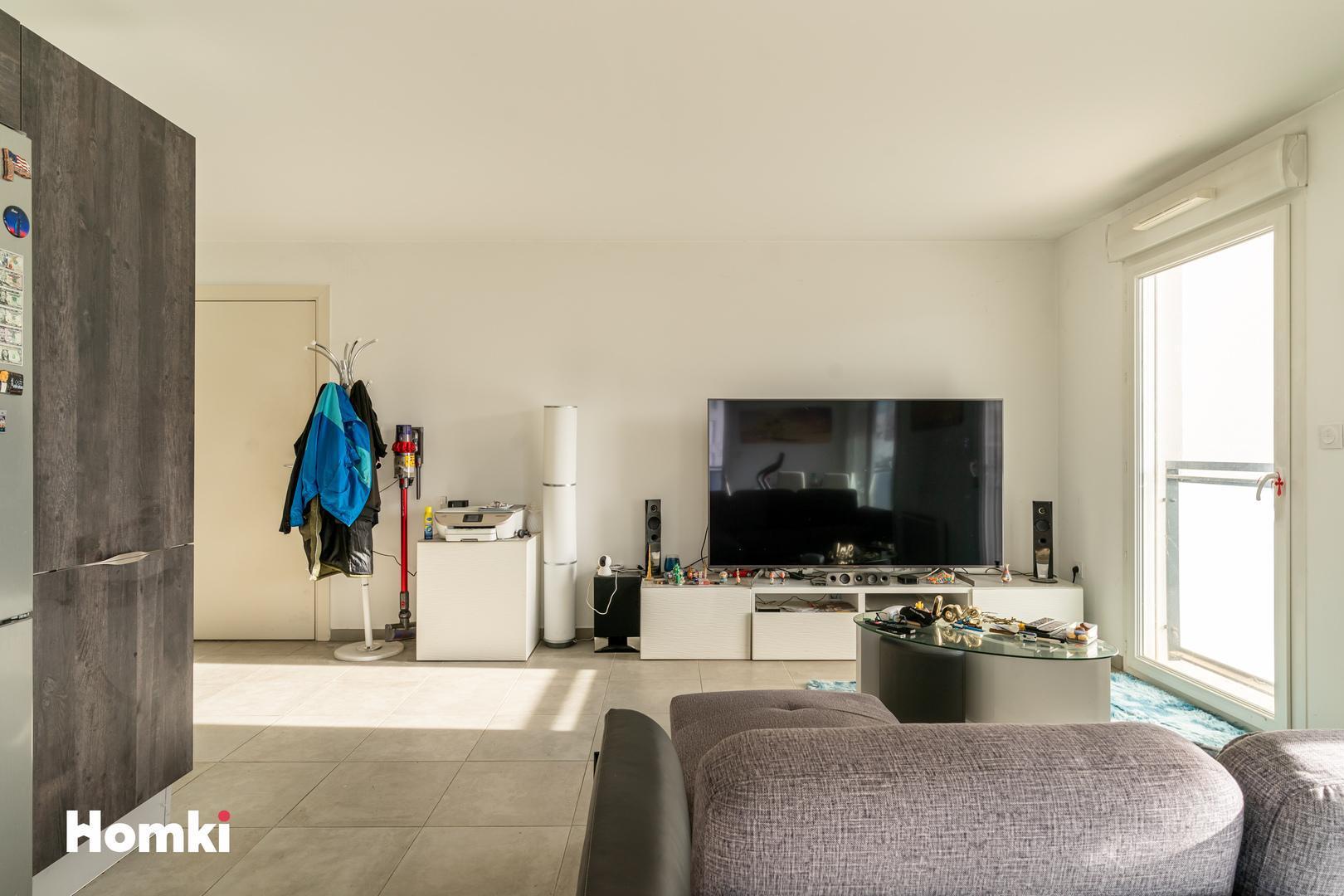 Homki - Vente Appartement  de 63.0 m² à Marseille 13013