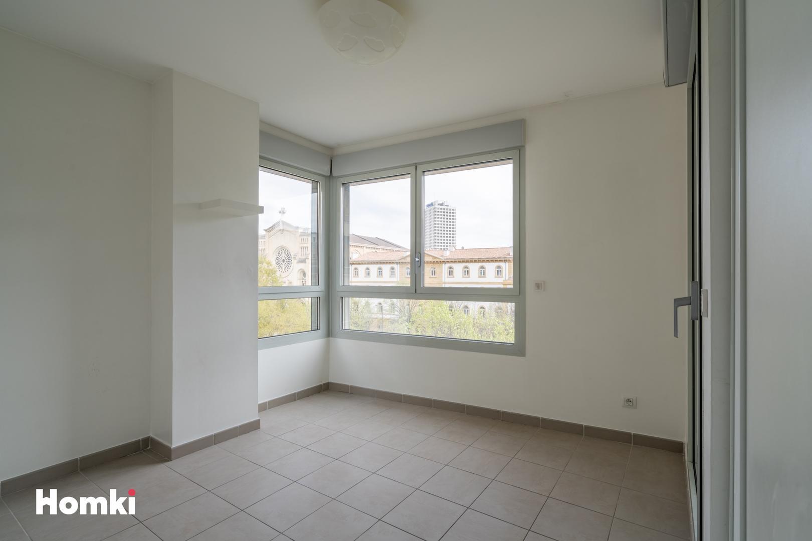 Homki - Vente Appartement  de 58.0 m² à Marseille 13008