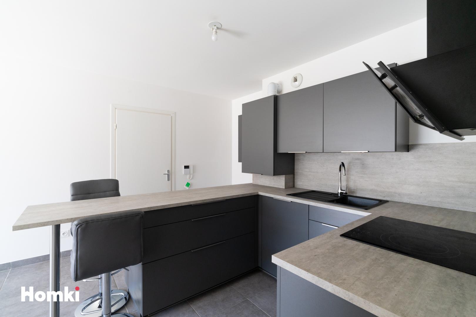 Homki - Vente Appartement  de 65.0 m² à Marseille 13007