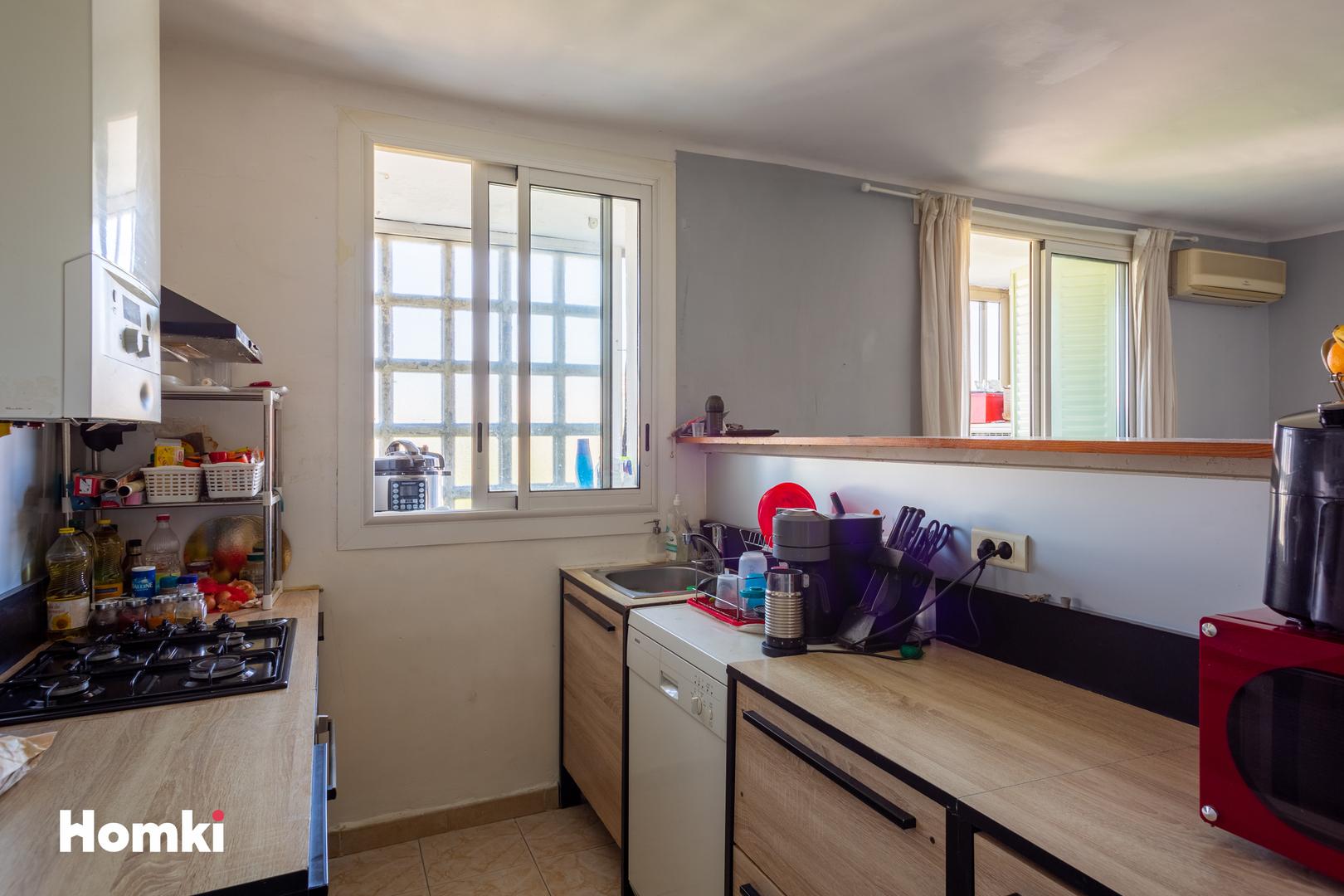 Homki - Vente Appartement  de 58.0 m² à Marseille 13009