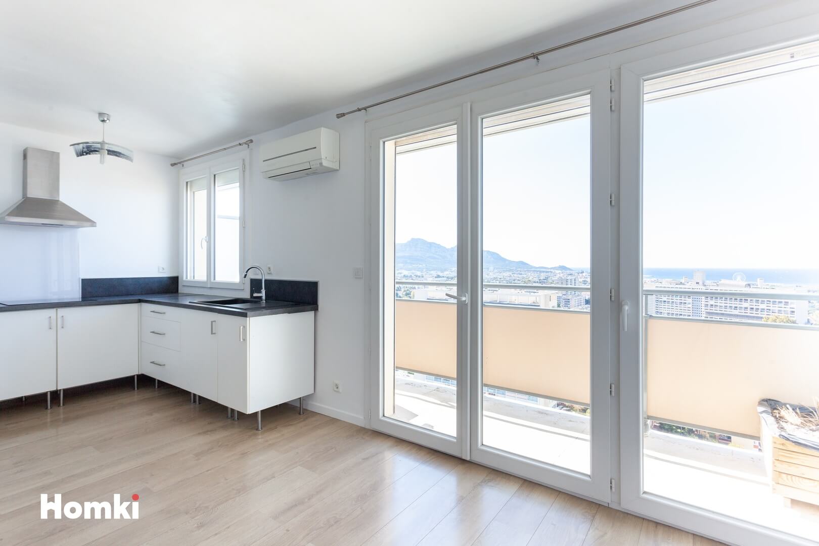 Homki - Vente Appartement  de 53.0 m² à Marseille 13009