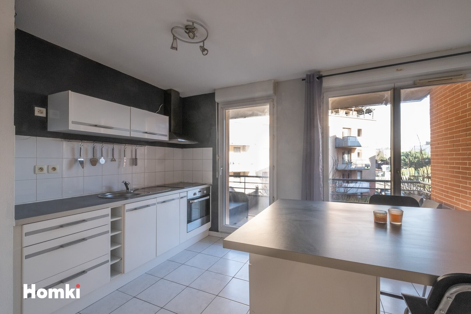 Homki - Vente Appartement  de 59.0 m² à Toulouse 31200
