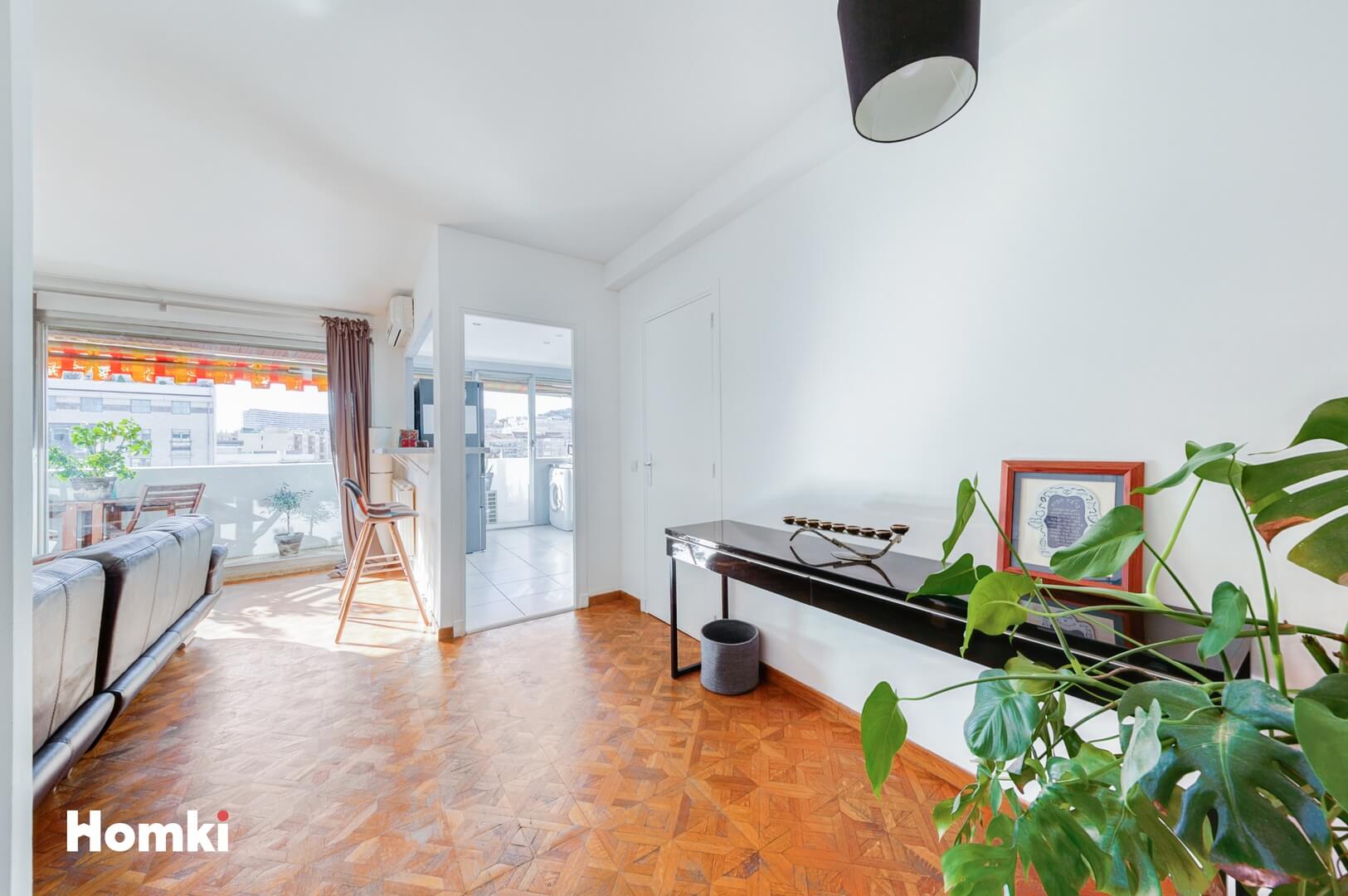 Homki - Vente Appartement  de 58.0 m² à Marseille 13008