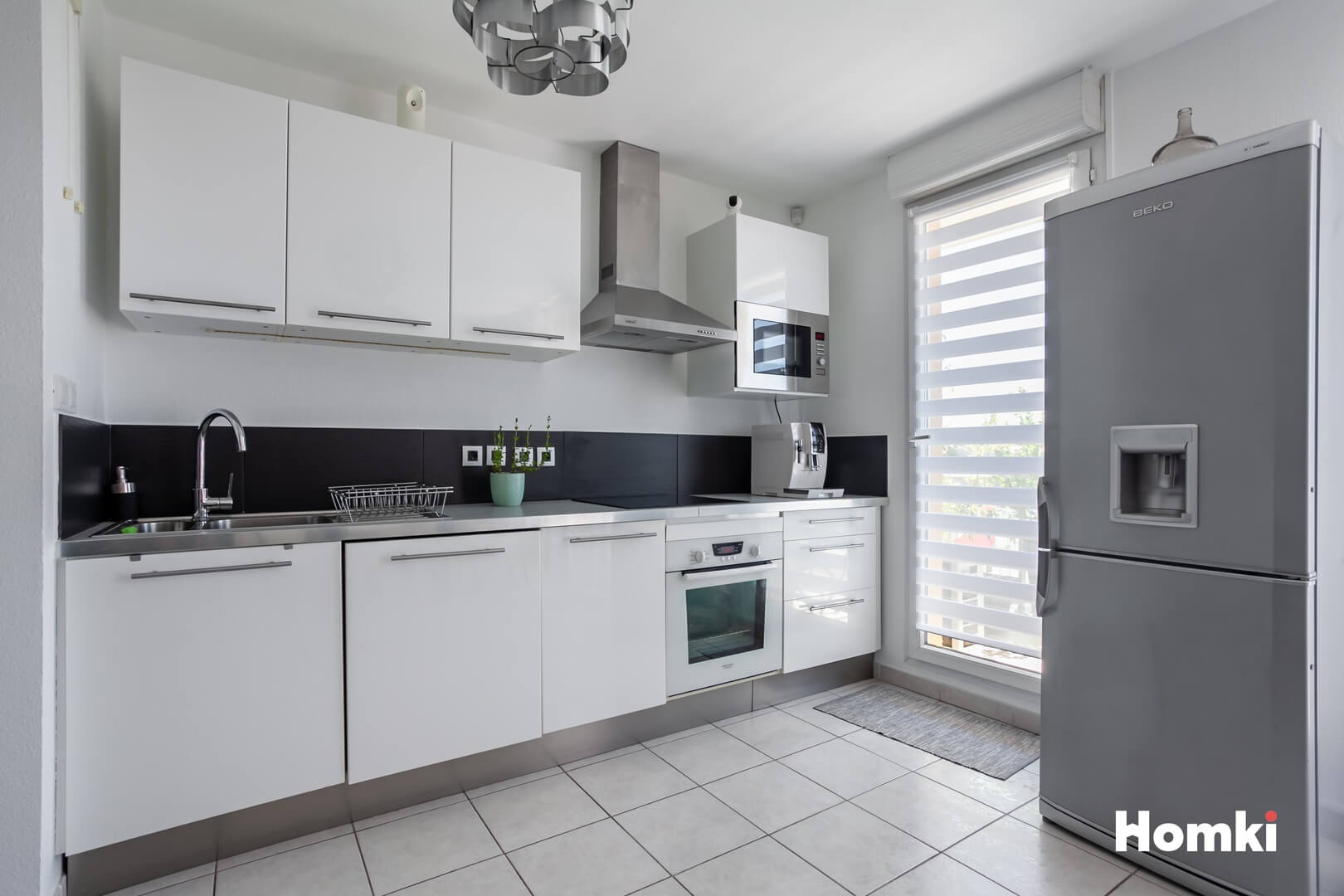 Homki - Vente Appartement  de 63.0 m² à Marseille 13015