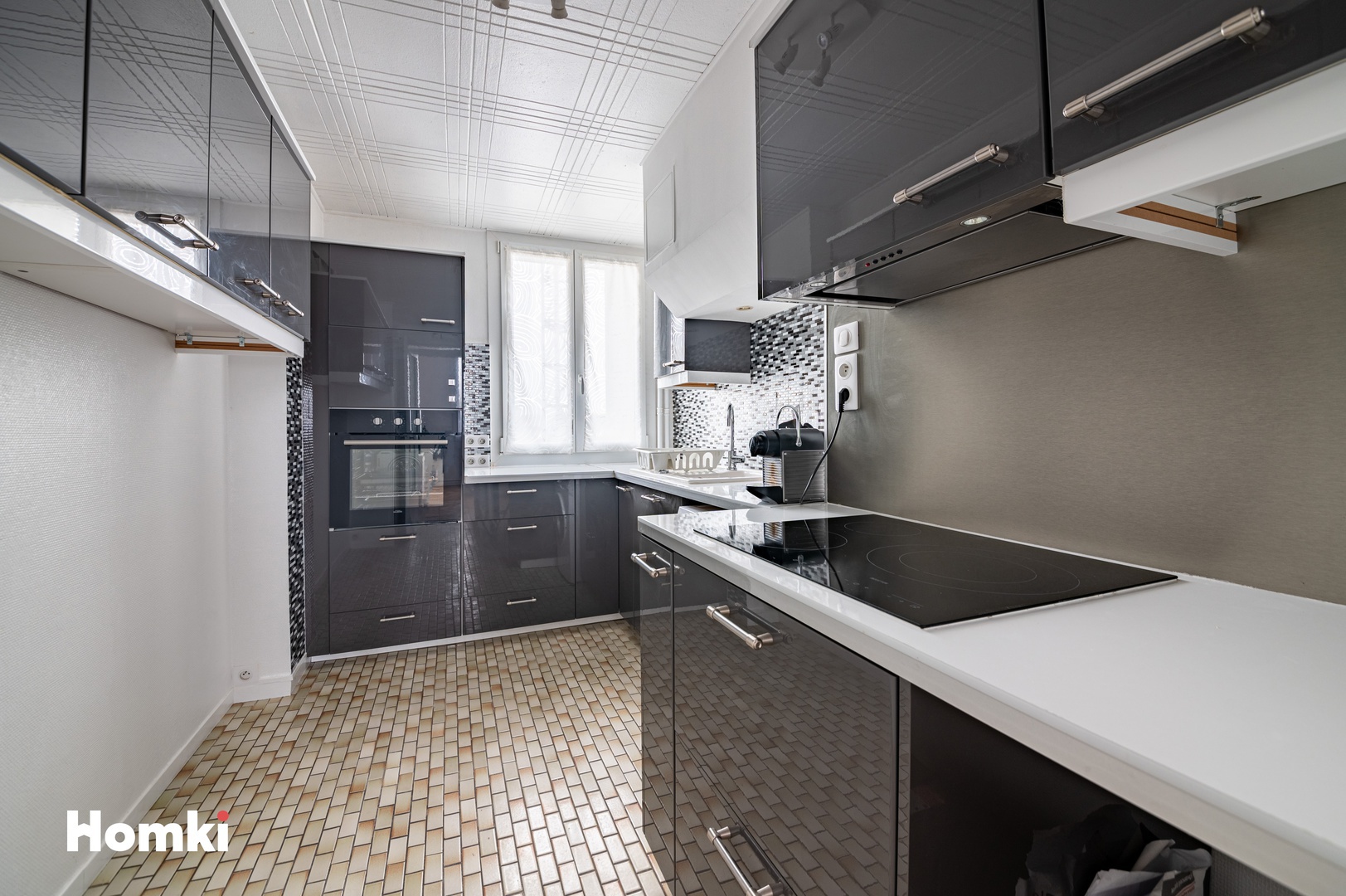 Homki - Vente Appartement  de 57.0 m² à La Mulatière 69350