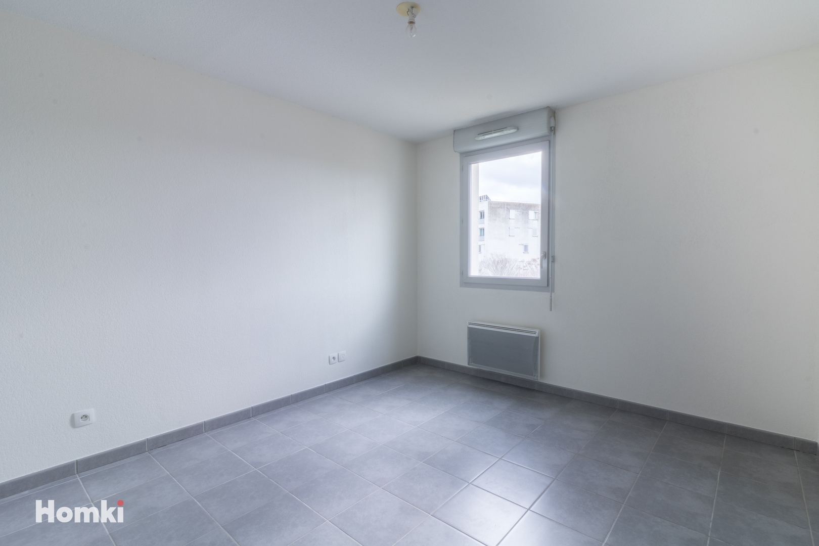 Homki - Vente Appartement  de 67.0 m² à Toulouse 31200